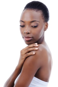 Skincare, touch and face of black woman in studio backdrop with shoulder, natural makeup and healthy glow. Cosmetics, dermatology and beauty model on white background for skin care, shine or wellness