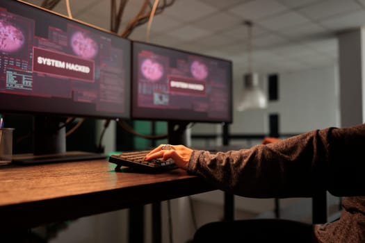 Woman hacker coding virus program