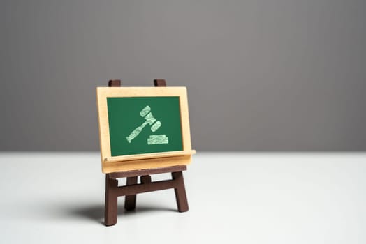 Chalk board and judge's hammer. The supremacy of international law. Win lawsuit. International judicial bodies. Protection of rights and freedoms. Arbitrage practice. Education and courses.