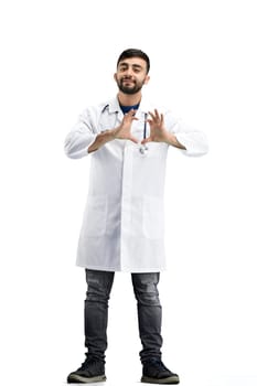 The doctor, in full height, on a white background, shows the heart