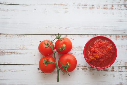Tomato paste with ripe tomatoes.