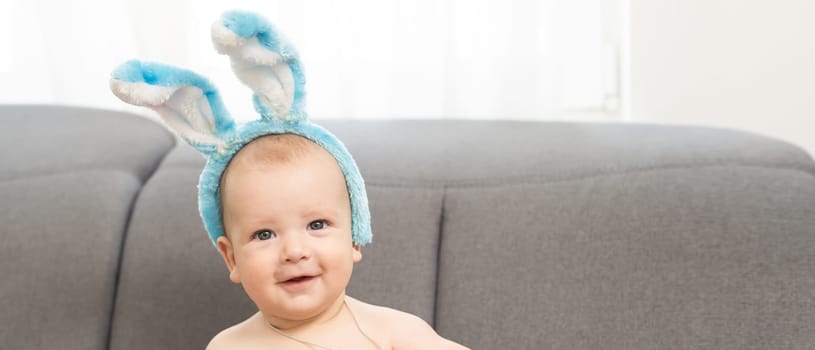 Cute little boy with bunny ears, Easter.