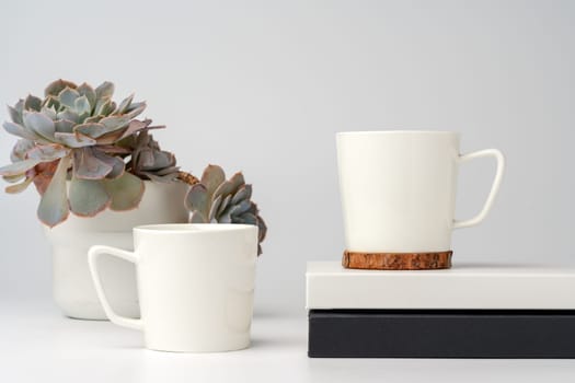 Coffee mug on white office table mock up