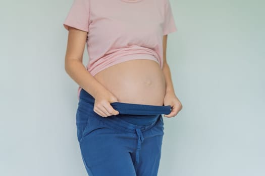 Chic maternity pants, comfy belly insert for expecting moms - stylish, practical, and perfect for the journey into motherhood