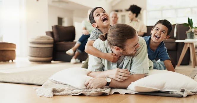 Funny, playing and father with children on floor in home living room laughing at comedy, joke or humor. Happy, dad and kids having fun, bonding and enjoying family time together in adoption house.
