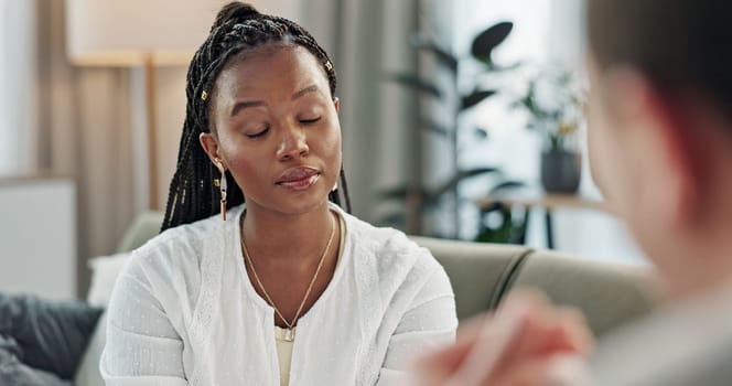 Psychology, mental health and empathy with a black woman therapist talking to a patient in her office. Support, consulting and trauma with a young psychologist listening to a client in grief therapy