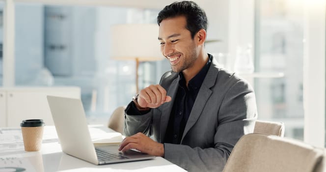 Happy man in office with laptop, market research and notes for social media review, business feedback or planning. Thinking, search and businessman networking online for startup, website and report.
