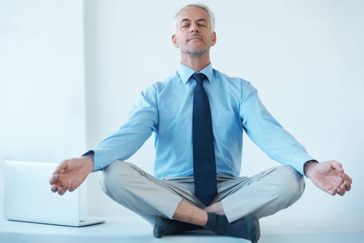 Businessman, meditation and hands for calm wellness for work stress relief or corporate, professional or mental health. Male person, lawyer and legs crossed for zen practice, mindfulness or peace