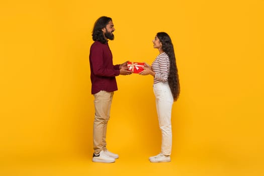 Side view of indian couple have St. Valentines Day celebration