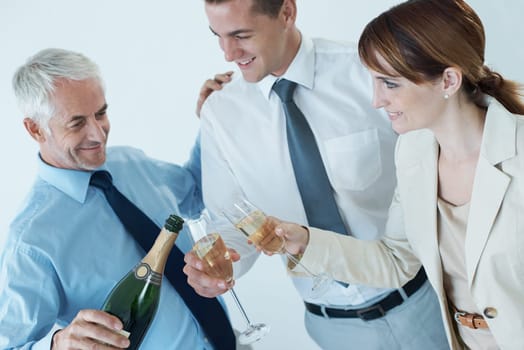 Champagne, boss or happy business people in office party in celebration of target or success together. Drinking, pour or toast with team, CEO or group of colleagues in workplace for winning or goals