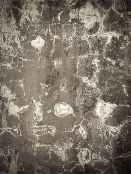 Grey cracked concrete wall texture
