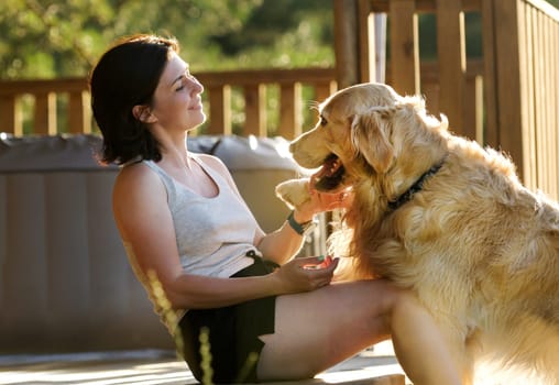 Girl Petting Golden Retriever Dog