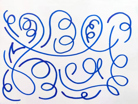 Abstract Blue Pen Doodles on White Paper. Series of whimsical blue ink doodles with loops and swirls freely drawn on a plain white background