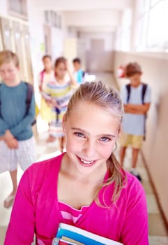 Child, friends and portrait in school hallway or classroom learning or students unhappy for lesson, knowledge or elementary. Girl, face and books or smile for education future in USA, campus or smart
