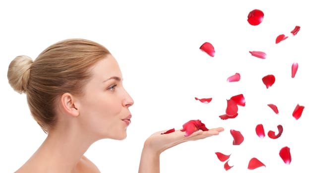 Woman, studio and blow with rose petals in profile for natural beauty, skincare or wellness by white background. Girl, model or person with flowers for celebration, organic confetti or Valentines Day