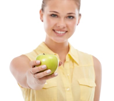 Hand, apple or portrait of happy woman giving a healthy choice isolated on white background. Nutrition vitamins, smile or female person in studio with fruit or offer for fiber, detox diet or wellness