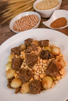 Moughrabieh is a popular dish, LEBANESE RECIPE FOR MOUGHRABIEH WITH BEEF AND SMALL ONIONS, SEMOLINA PEARLS AND CHICKPEAS