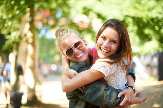 Portrait, women or happy friends hug at music festival outdoor, event or bonding at concert. Face, embrace or girls together at party for celebration, carnival or smile of people having fun in nature