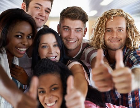 Friends, students and thumbs up for college, portrait and promotion for university and education. People, diversity and approval for school or agreement, academy and thank you for knowledge in class
