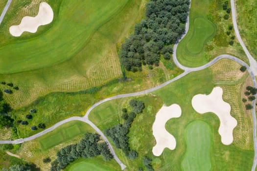 Landscape in a golf course an aerial view of a green field, lawn, and grass. 
