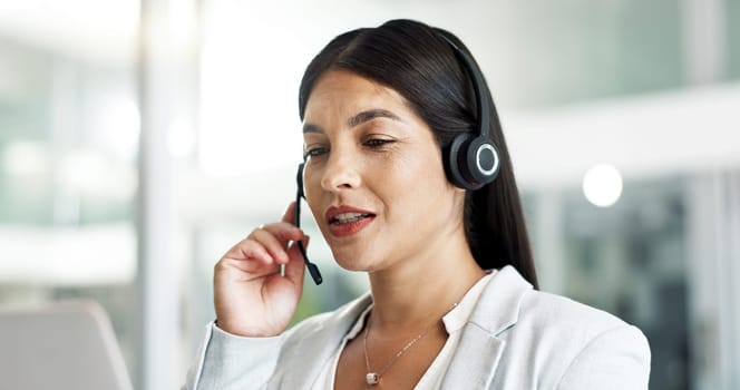 Woman consultant, call center communication and computer for customer service, support or advice in office. Philippines advisor or business agent speaking for contact us, FAQ or e commerce on laptop