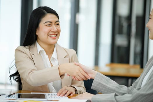 Businesswomen Handshake Sealing a Successful Deal