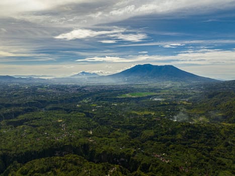 Aerial view of Mountains covered rainforest. Sumatra, Indonesia.