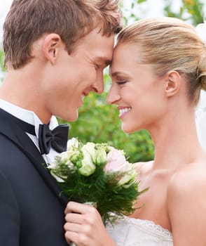 Couple, man and woman in closeup on wedding in love, happiness and affection in relationship with romance and joy. Newlyweds, groom and bride in ceremony with flower, excited and beautiful.