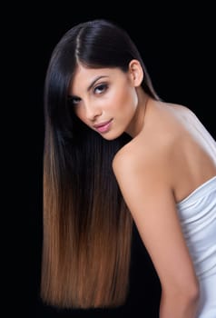 Hair care, beauty and portrait of woman in studio with salon, healthy or conditioner treatment. Wellness, confident and female person with long, shiny and cosmetic hairstyle by dark black background.