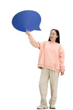 A woman, full-length, on a white background, with a blue comment mark
