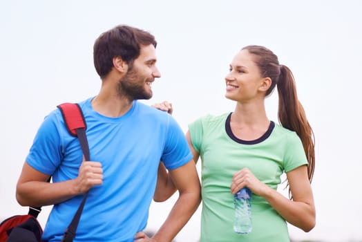 Fitness, couple in nature and workout outdoor, happy and healthy with partner, physical activity and support. People smile for wellness, exercise together in park and training for bonding with trust