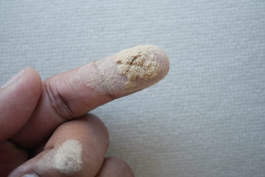 Dust and Dirt on a finger