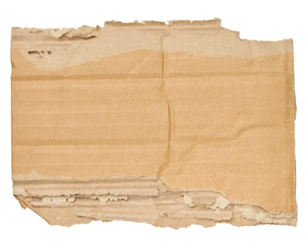 Piece of brown cardboard with torn edges on isolated background