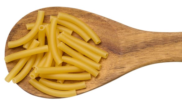 Tube-shaped pasta made from white wheat flour in a wooden spoon
