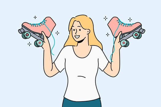 Woman holds retro roller skates, inviting you to ride together in park in fresh air