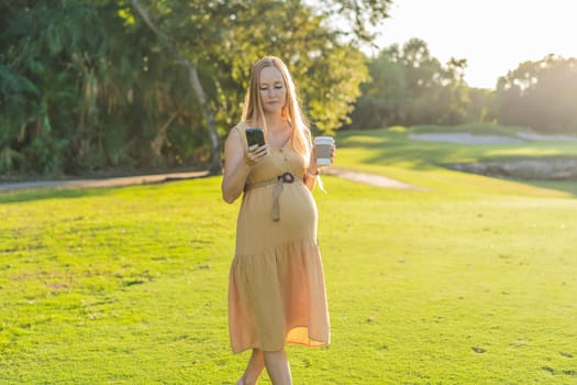 pregnant woman enjoys a cup of coffee outdoors, blending the simple pleasures of nature with the comforting warmth of a beverage during her pregnancy