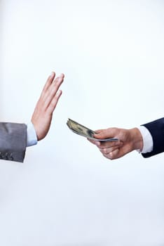 Business people, hands and rejection with money for bribe, payment or fraud on a white studio background. Closeup of employee saying no to cash, dollar bills or paper for secret or bribery on mockup