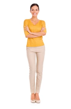 Woman, fashion and portrait for arms crossed, confident and happy in outfit in studio for minimalist style. Female person, smile and yellow top by white background, designer in smart apparel.