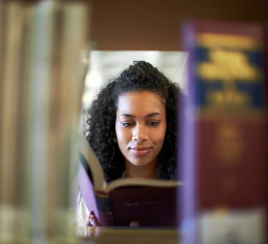Reading, bookshelf and woman with books in library for knowledge, learning and studying at college. University, education and person with textbook for literature, research and information at academy