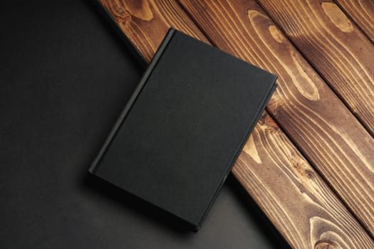 Blank notepad on a brown wooden surface