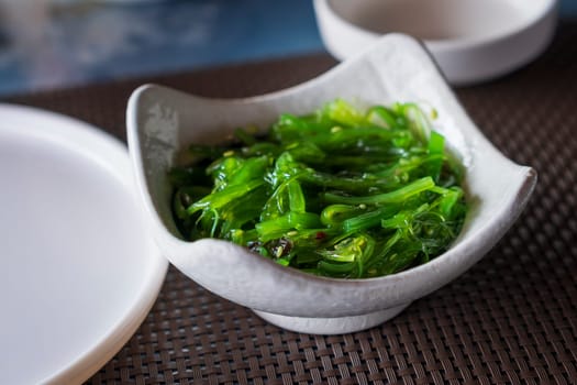 A bowl of Wakame seaweed salad, typical dish in East Asia.