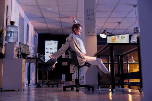 Entrepreneur doing relaxation exercises in startup office