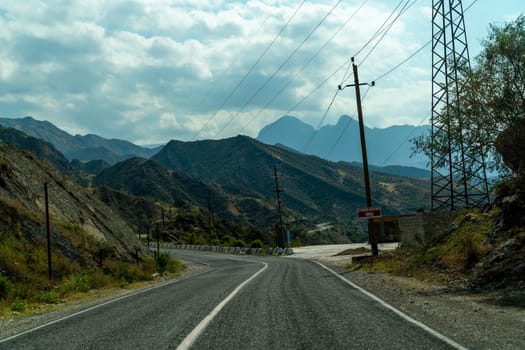 View from the car of an asphalt road in the mountainous area of Dagestan