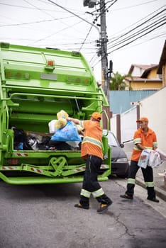 Garbage truck, dirt and team with collection service on street in city for public environment cleaning. Junk, recycling and men working with waste or trash for road sanitation with transport.