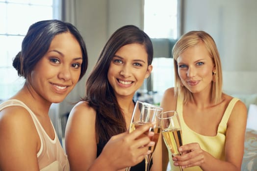 Women, friends and portrait with champagne for celebration, party and luxury in hotel or bedroom. Face of a young group of people with wine glasses, cheers and toast for holiday or congratulations