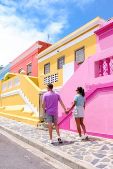 couple walking at the colorful streets of Bo Kaap in Cape Town,South Africa
