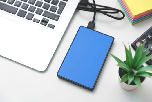 External backup disk drive connected to laptop