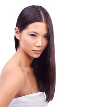Woman, brazilian and treatment for haircare in studio, beauty and pride for keratin results on mockup space. Asian female person, hair and shampoo for cosmetics, white background and conditioner