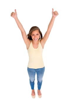 Woman, smile and thumbs up for winning achievement, success or support in studio with isolated white background. Top view, hand gesture and female model for like emoji, agreement and yes sign.
