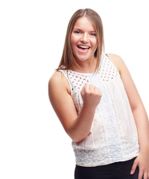 Woman, winner and fist for portrait in studio with success, goal or happy by white background. Person, girl and smile with celebration, cheers or excited for achievement, giveaway or prize in contest